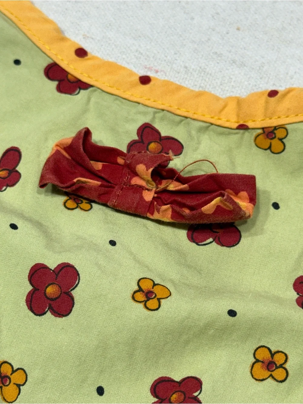 Yellow Floral Apron Dress with Red Accents